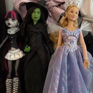 Fashion Doll Trio Set with Purple, Black, and Green Outfits